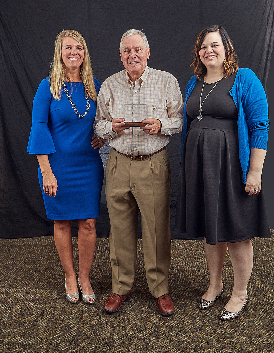 Chasity Yoder, UW Executive Director Tom Herman, Leadership Giving Chair Jamie Vonalt, UW Executive Assistant